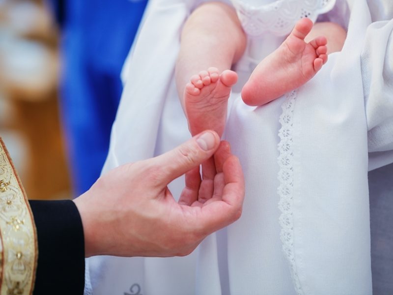 Ceremony of Christening newborn in Christian Church